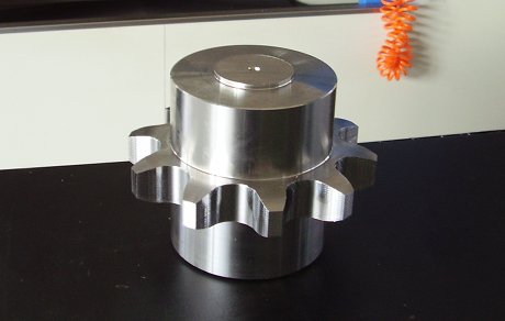 Steel cylindrical component with toothing