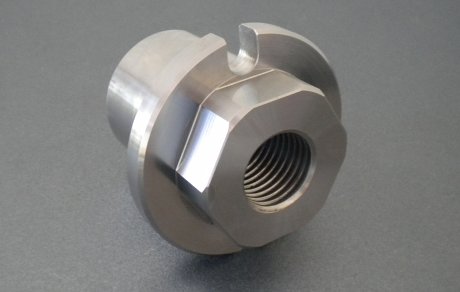 Steel threaded component worked by a CNC turning lathe